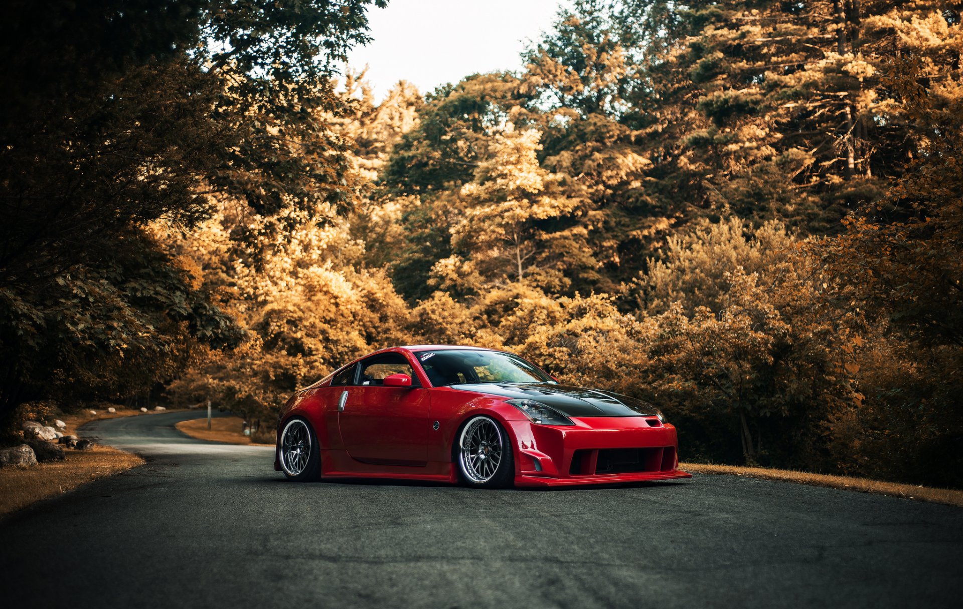 nissan 350z red position nissan red body kit road autumn