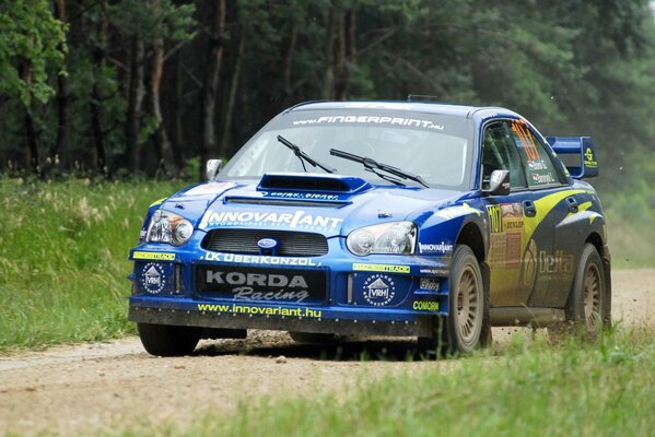 Subaru lifts gravel up at rally