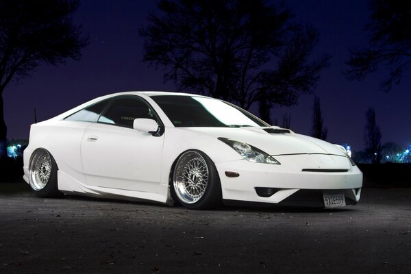 Tuned white toyota celica