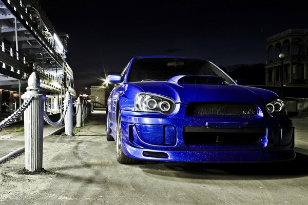 Blue Subaru impreza car at the pier