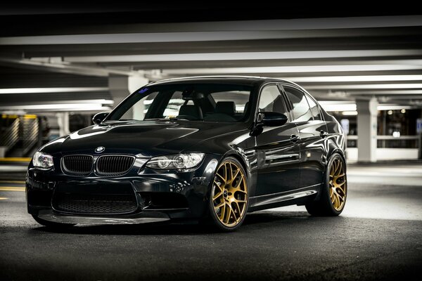 Dark blue BMW m3 in the parking lot