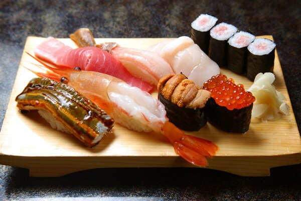 Shrimp fish caviar sushi on a board