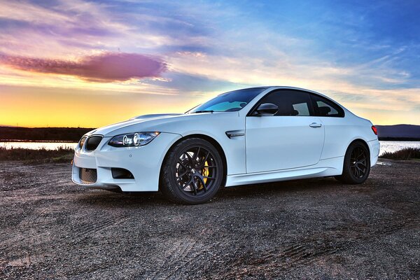 White BMW in the sunset