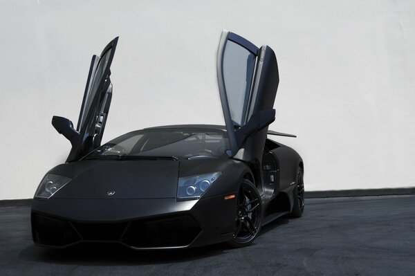 Black Lamborghini with open doors