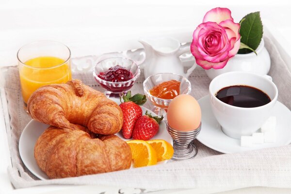 Beautiful breakfast with croissants and coffee