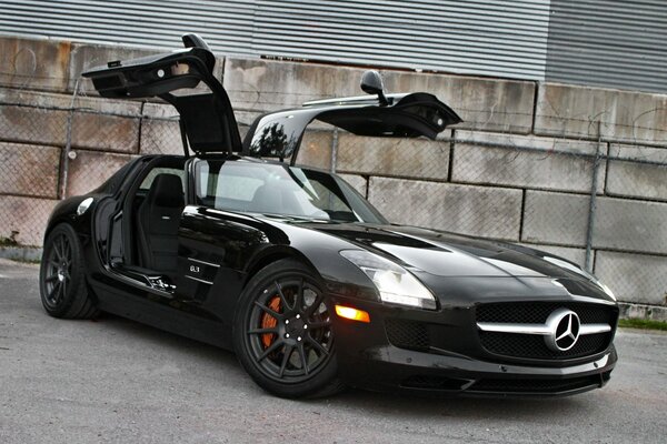 Black Mercedes on an abandoned landfill