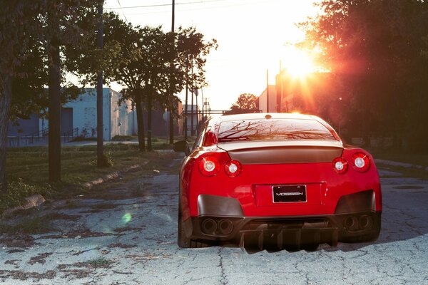 Red Nissan view of the abrasion in clear weather