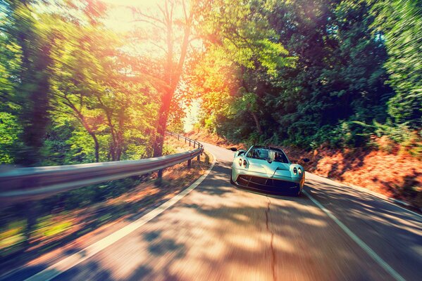 Pagani in sunlight at speed