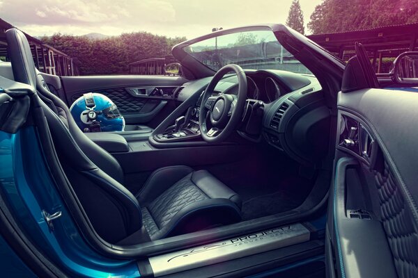 Sports car salon leather and blue helmet