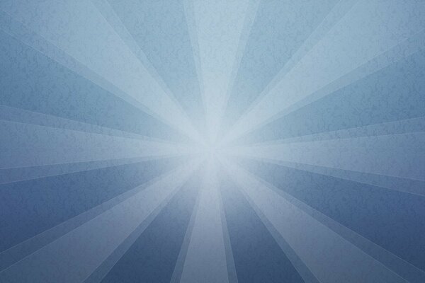 Rays of light on a background of blue wallpaper