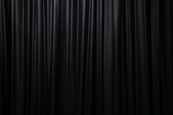 Heavy black curtain on the stage