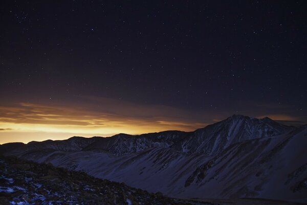 The beauty of winter mountains against the sky