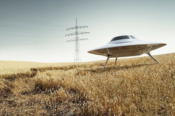 Ufo im Feld auf Draht Hintergrund. elektrische Fernleitung