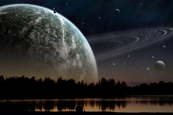 Un enorme pianeta e le sue lune nel cielo sopra la foresta