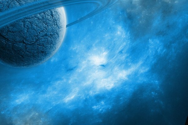 Pianeta con anelli sullo sfondo di una nebulosa nello spazio
