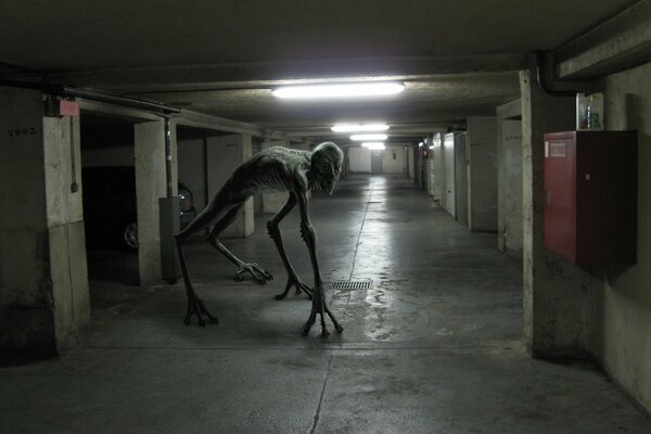 A mutant monster in the corridor at the underground parking lot