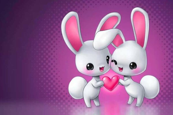 Dwa króliczki trzymają różowe serce