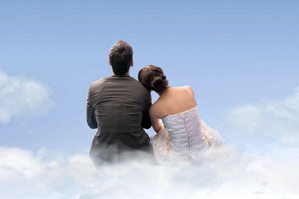 Newlyweds sitting on a cloud