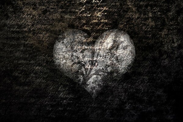 Heart on a black background with inscriptions