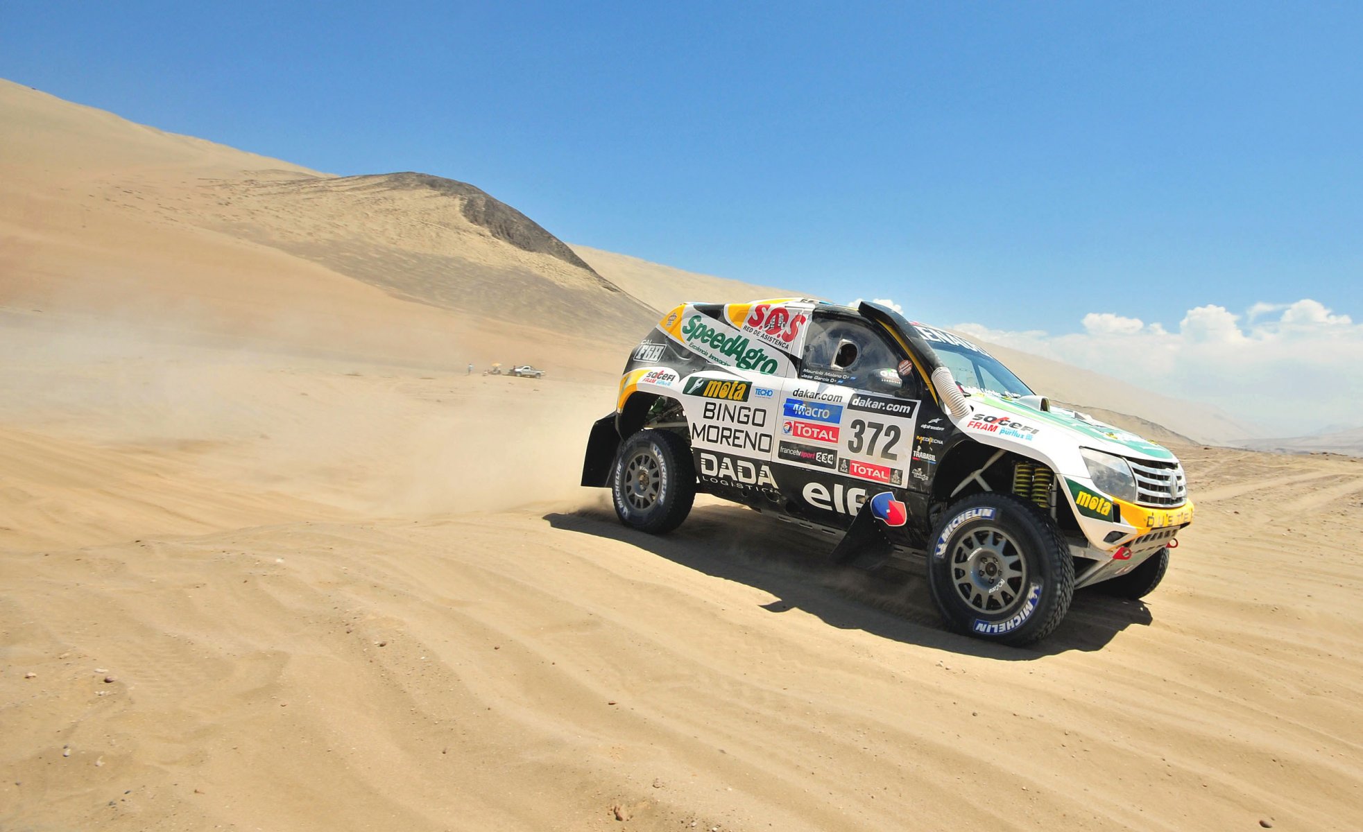 renault dakar rally sport sabbia deserto rally auto auto suv vista laterale velocità gara