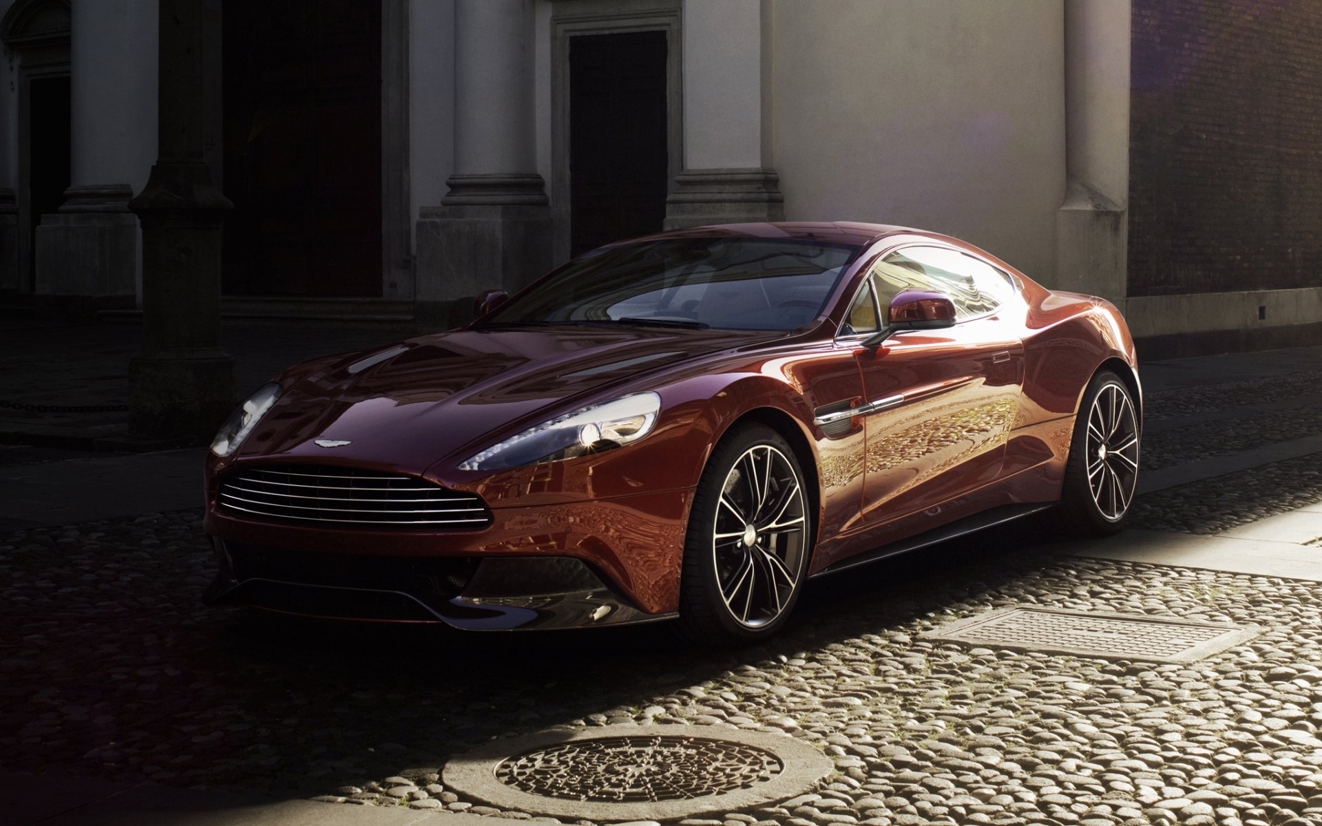 aston martin vanquish aston martin vancouver supersamochód bordowy cień tło