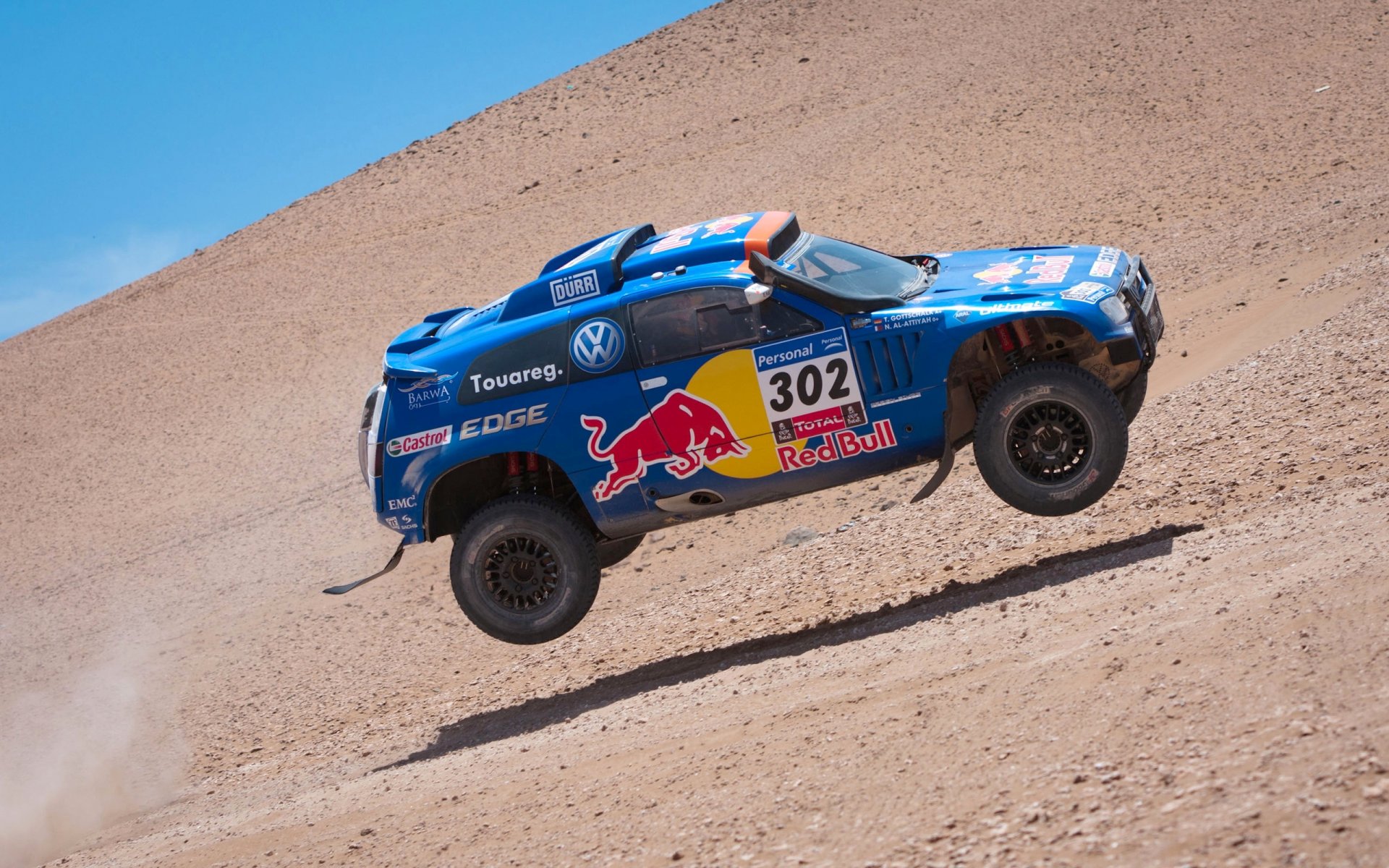 volkswagen tuareg azul dakar rally rally en el aire velocidad toro rojo carrera