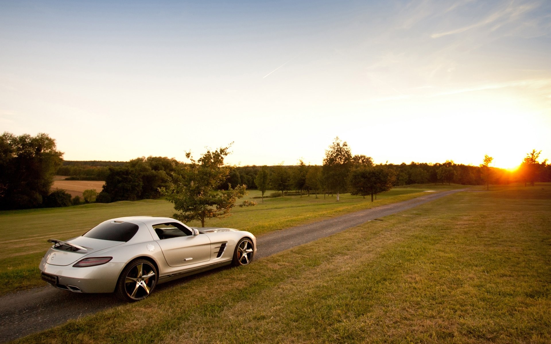 mcchip dkr mercedes-benz sls amg mc700 mercedes sls amg supercar argent vue arrière route coucher de soleil ciel