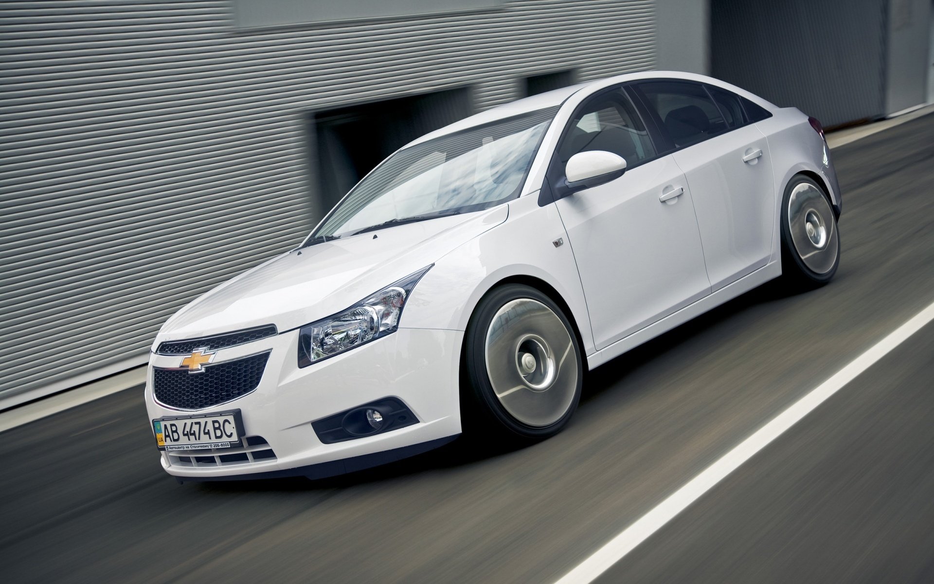 auto chevrolet cruze limousine weiß