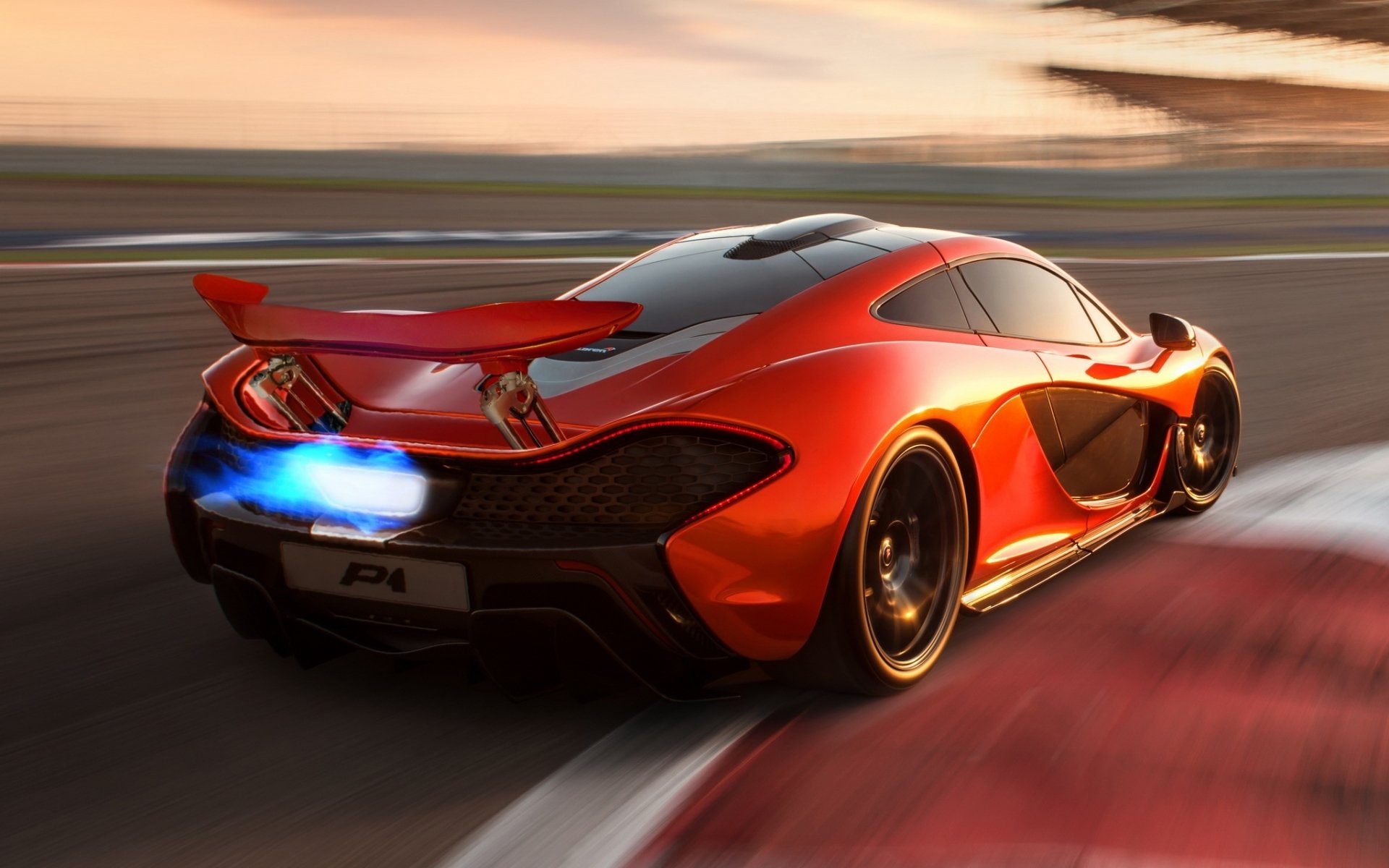 mclaren p1 koncepcja mclaren p1 koncepcja supersamochód pomarańczowy widok z tyłu płomień.tor wyścigowy