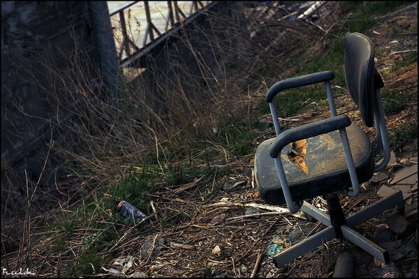 An abandoned house and a computer chair