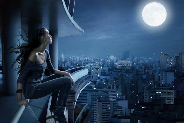 Dziewczyna samotnie patrzy na Księżyc