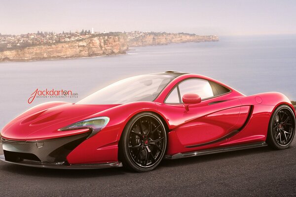 Red sports car on the background of the sea