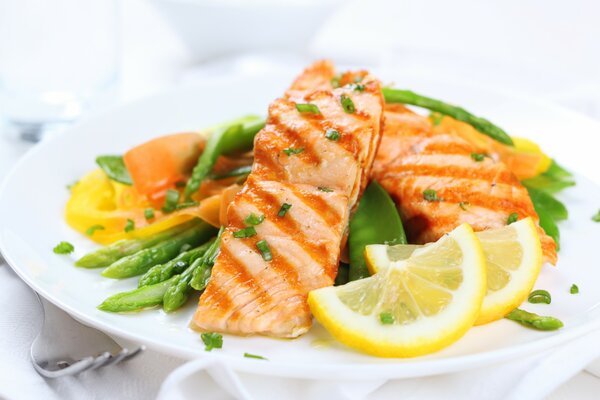 Salmon with asparagus lemon and baby peas