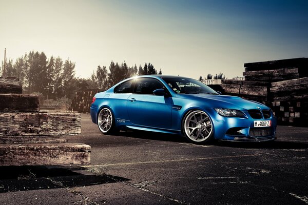 Blue BMW in the middle of abandonment