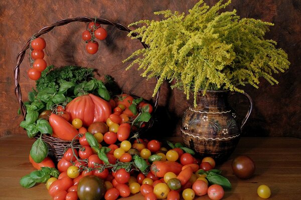 Still life vase with flowers and tomatoes