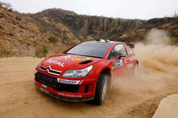 Citroen rally participant drives with great speed