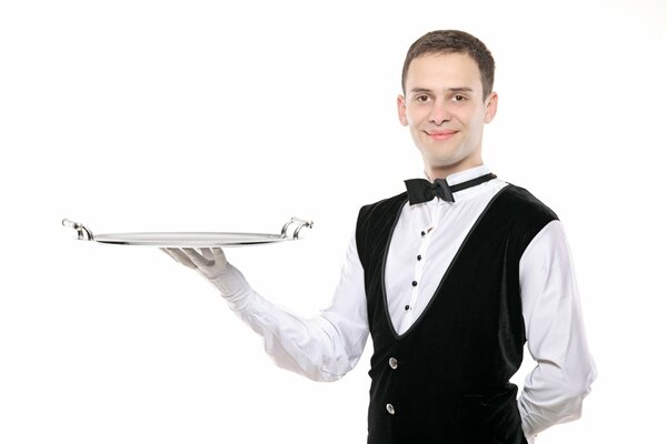 A man in a waiter s uniform with a tray in his hand