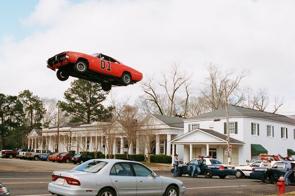 Jump of the red car - a scene from the movie