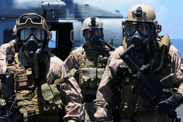 Military disembarkation from a helicopter with weapons