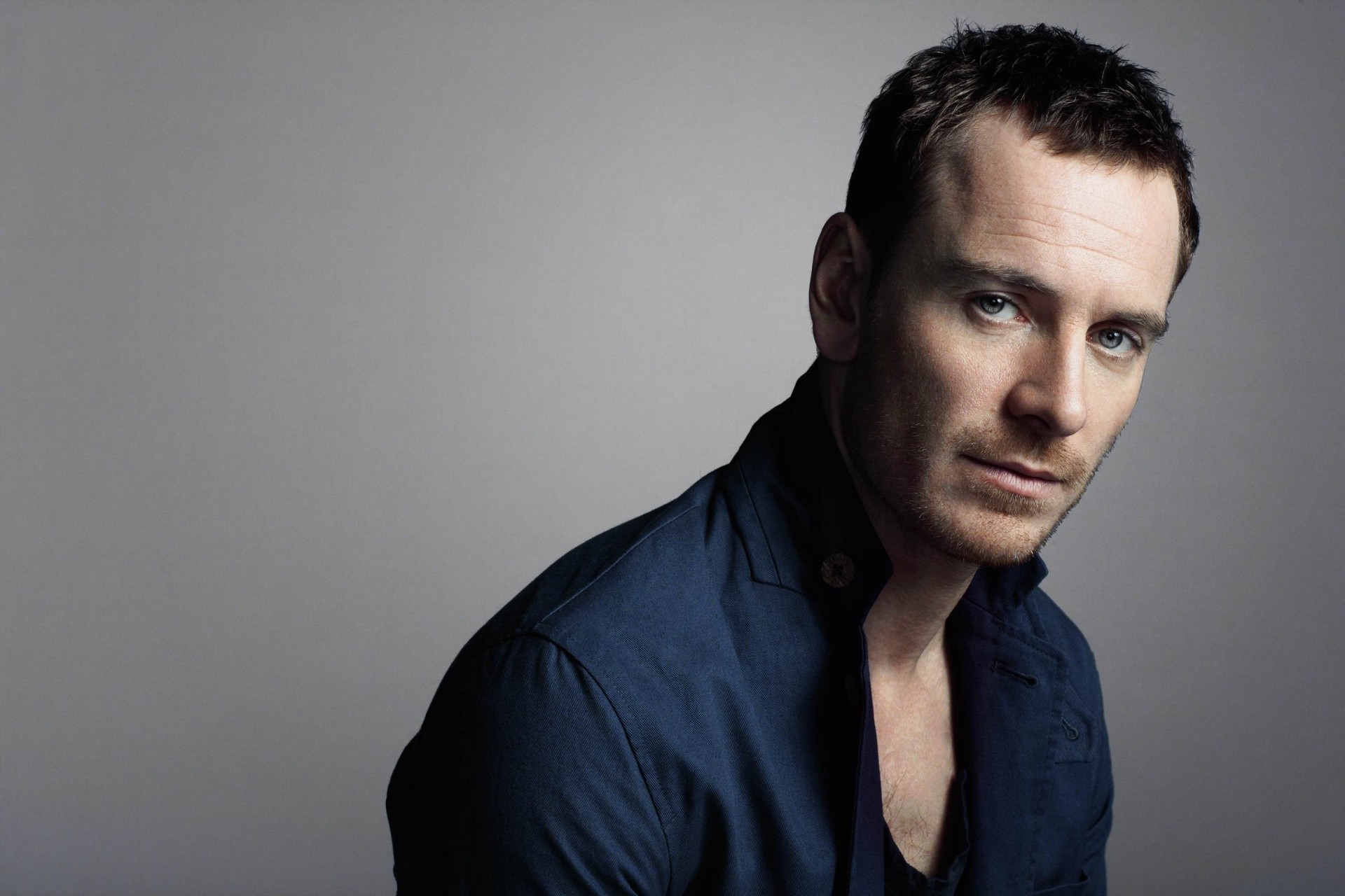 man producer michael fassbender gray background actor