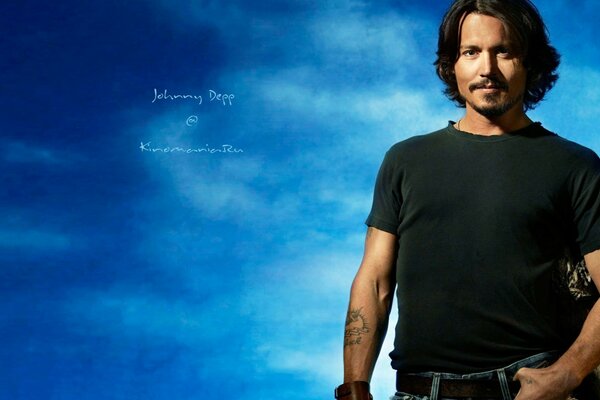 Actor Johnny Depp against the sky