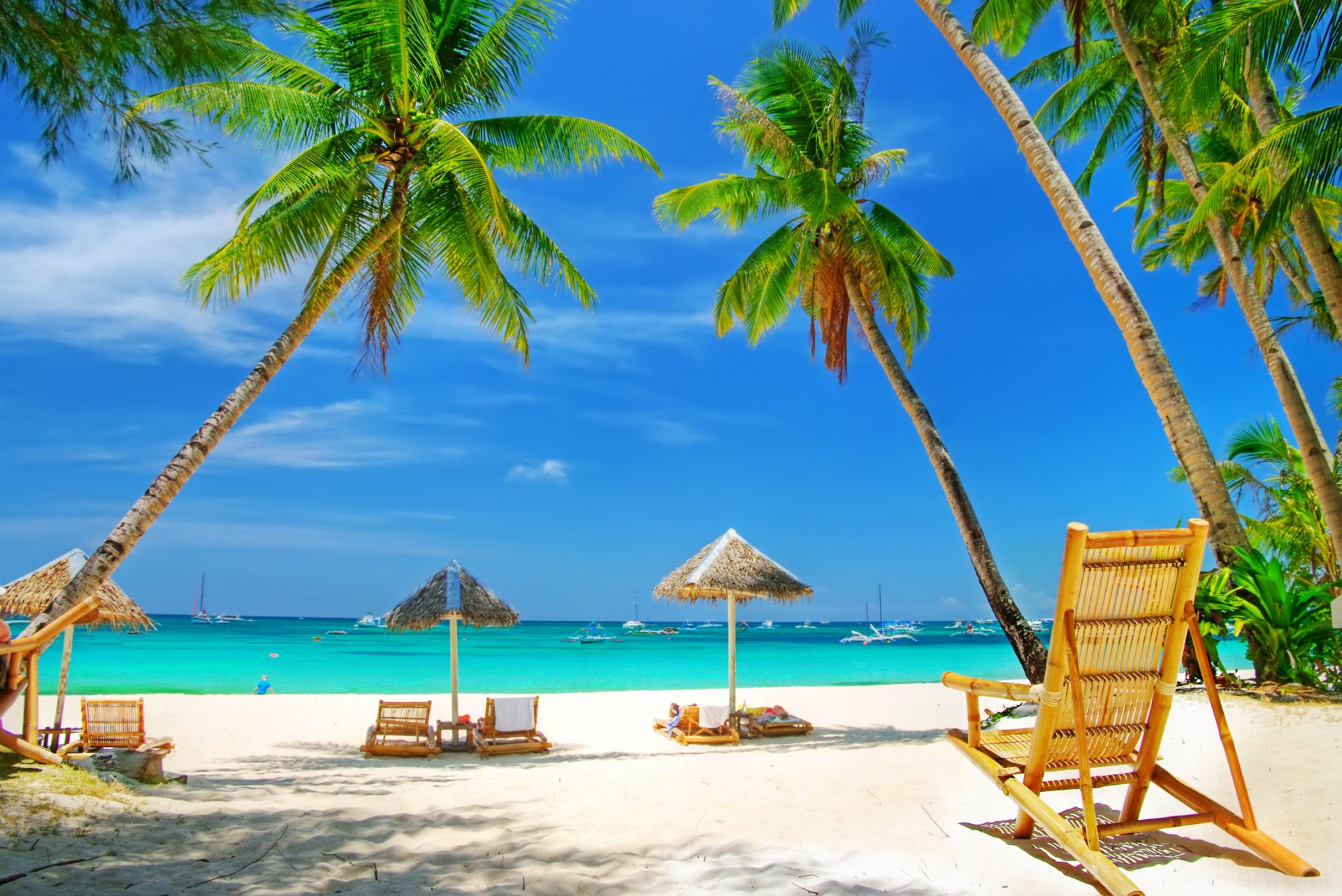 meer strand sand palmen sonnenschirme erholung