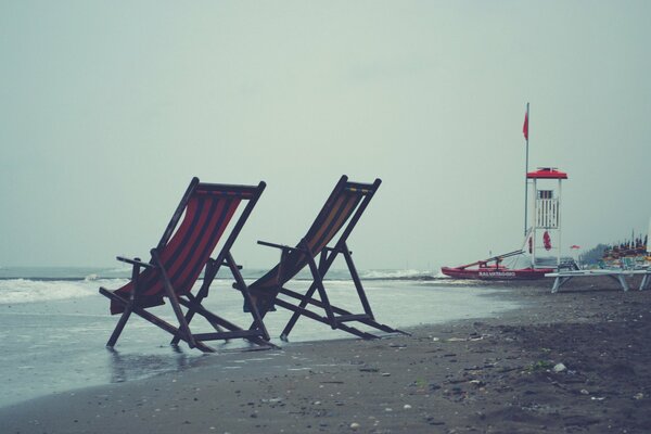 Sunbeds on the beach on a cloudy day