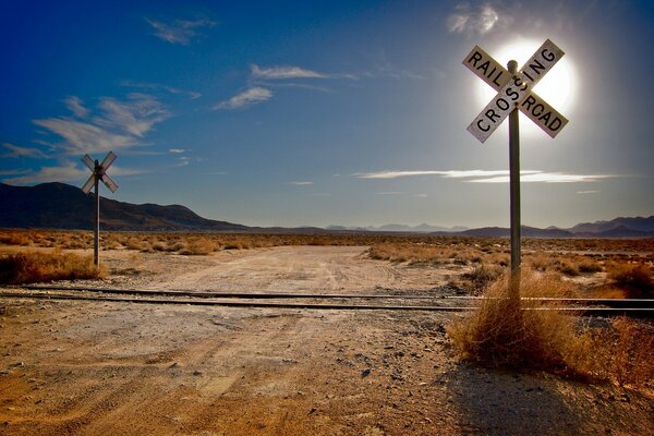 Railway in the desert at dawn