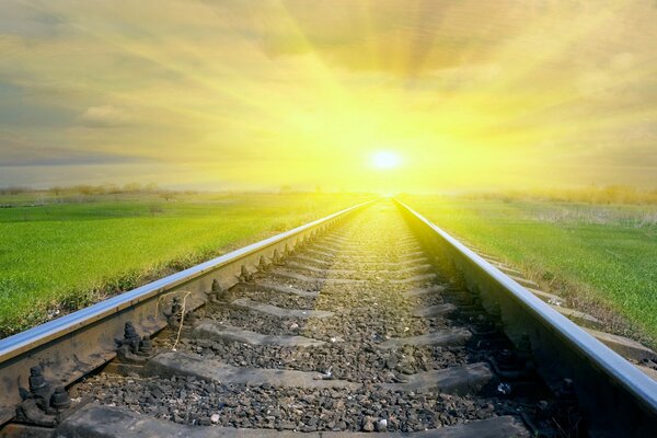 El ferrocarril que sale al atardecer