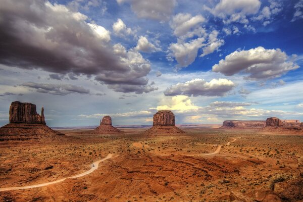 Desert and beautiful fluffy clouds