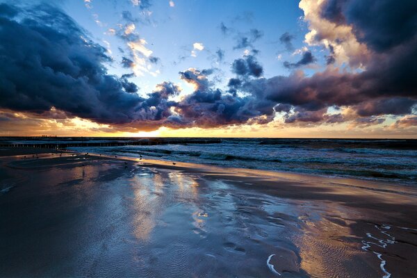 Gloomy clouds over the beach coast