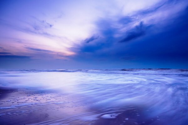 The blue sky merges with the blue sea. Beautiful landscape