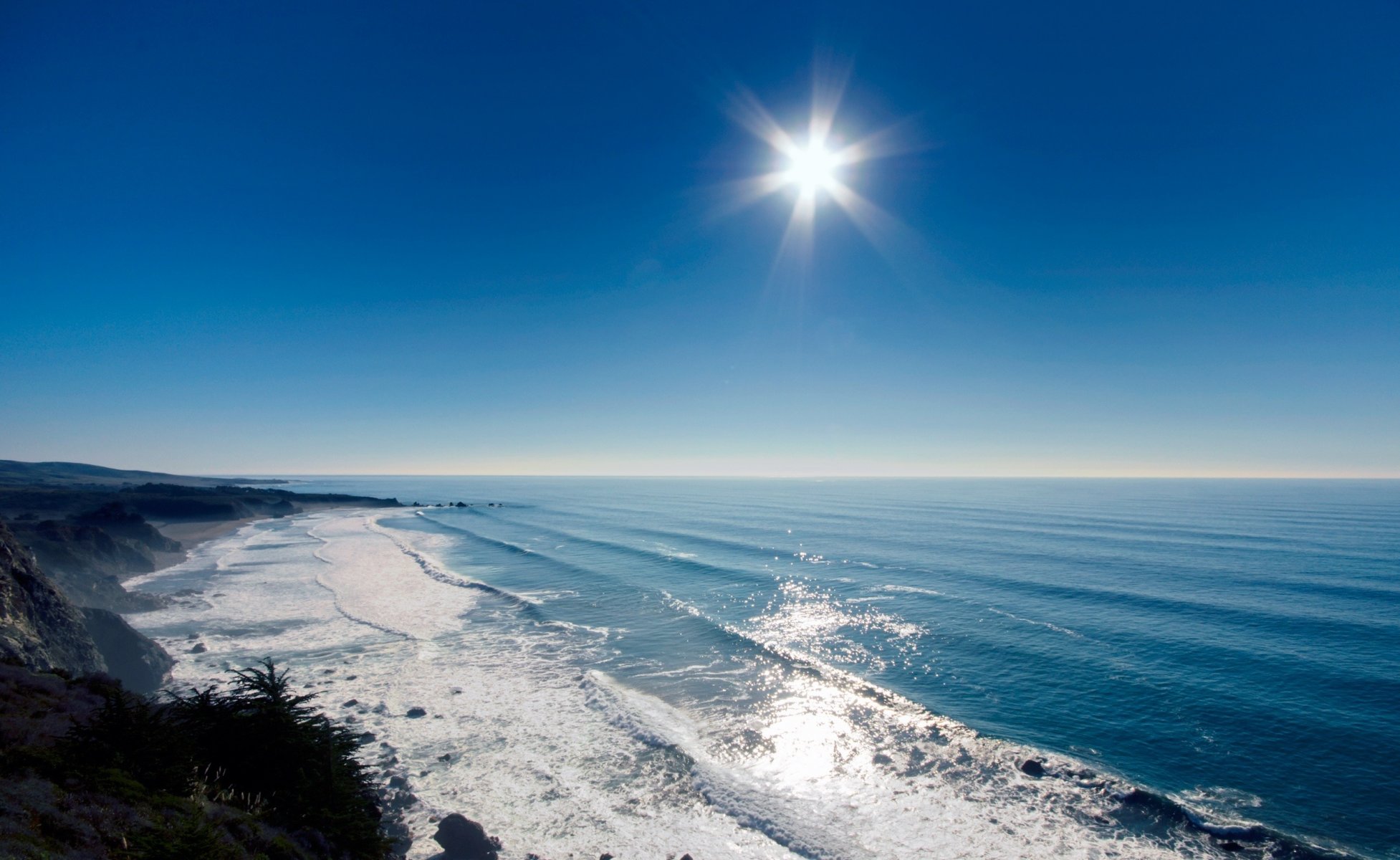 ea water ocean nature landscape grass rock sun light ray