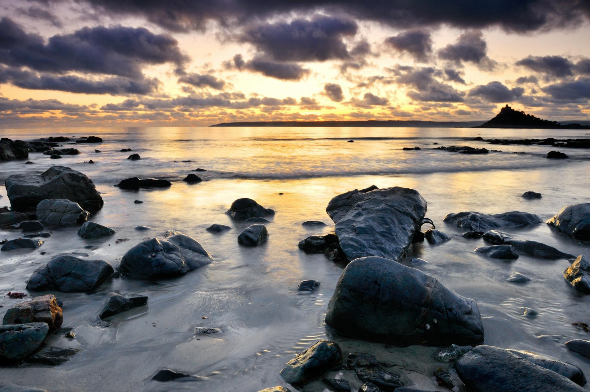 ocean water stones night sky photo